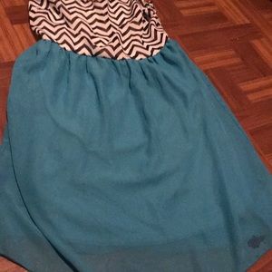 Turquoise dress with zigzag black and white top